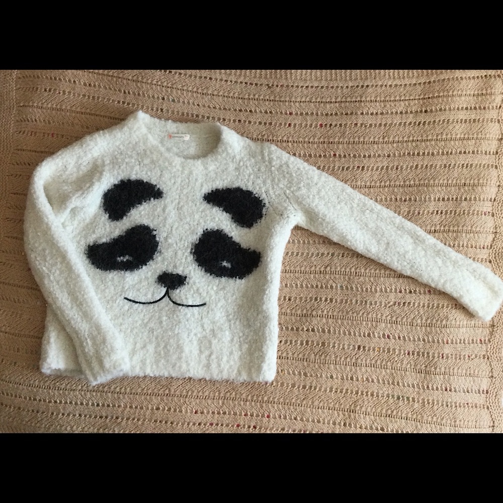 Girls fuzzy white panda sweater.